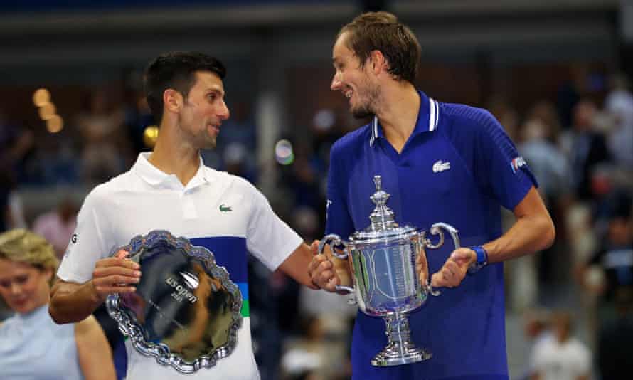Novak Djokovic talks to the winner, Daniil Medvedev. The runner-up said he was ‘the happiest man alive’ after his ovation from the New York crowd.