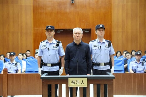 Hui Ka Yan, the founder of China's Evergrande Group stands in court at the Shenzhen Intermediate People's Court, in Shenzhen, Guangdong province, on 20 August.