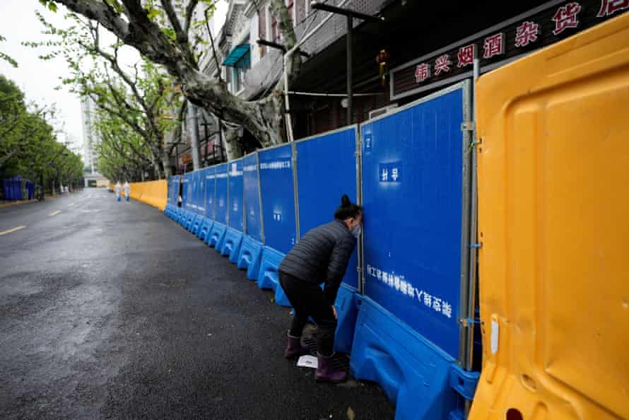 Fear, paranoia, anger – this is life under China’s zero-Covid strategy | Anonymous 1 A woman tries to buy food, Shanghai, 14 April.