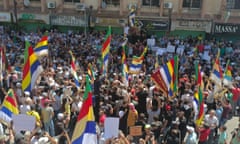 People gather to protest against Bashar al-Assad’s regime in Suwayda in Syria.