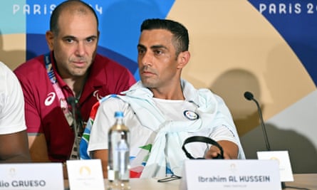 Ibrahim Al Hussein of the Paralympic Refugee Team talks to the media in Paris