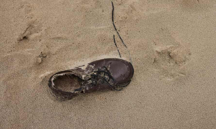 abandoned shoe on Plage du Braek, near to Loon-Plage, Dunkirk