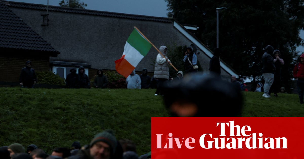 Orange Order march proceeds through Portadown’s Garvaghy Road after court ruling