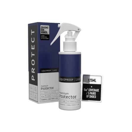 A bottle of Liquiproof shoe protector spray stands beside its box and coverage card