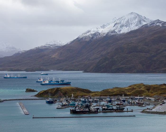 It’s closer to Beijing than Washington – and residents of this Alaskan outpost are reeling from Trump’s policies