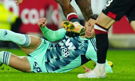 Brentford v Fulham: Premier League – live | Premier League 1 Ivan Toney of Brentford accidentally catches Sasa Lukic of Fulham in his face as they tussle for the ball.
