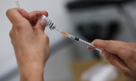 A Covid jab vaccine jab is prepared