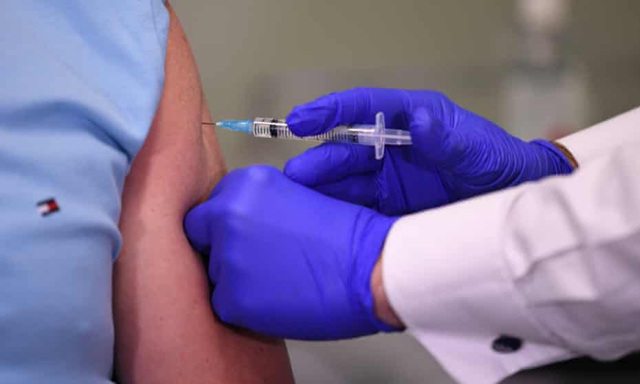 A person receives a Covid vaccine jab