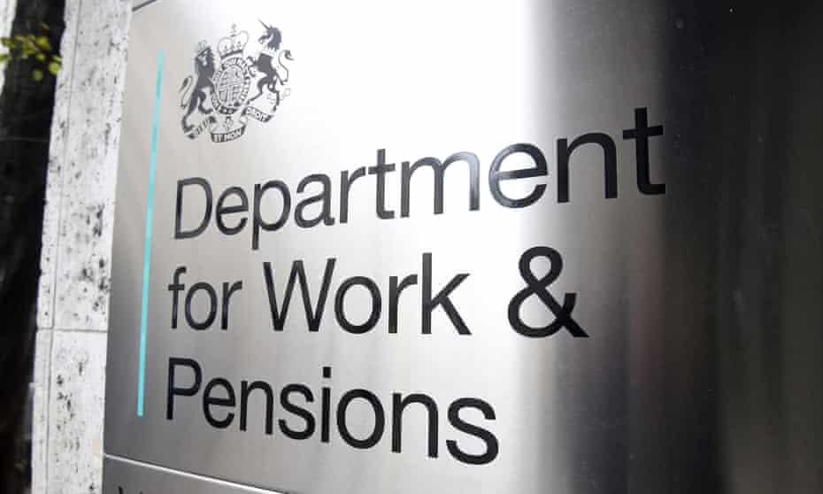 A sign is seen outside the Department for Work and Pensions in Westminster, London