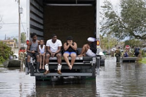 People are evacuated from floodwaters in the aftermath of Hurricane Ida in LaPlace.