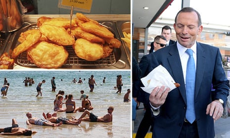 Potato scallops (or cakes), former Prime Minister Tony Abbott holding a sausage sandwich (or sausage in bread) and people at the beach wearing swimmers (or cossies or togs)