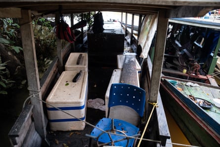 A boat filled with pirarucu which was seized and picked up by police.