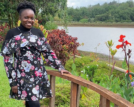 Elizabeth Odondi standing by a bridge in a garden