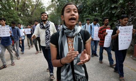 Students shout slogans during a protest against sexual violence in Kolkata