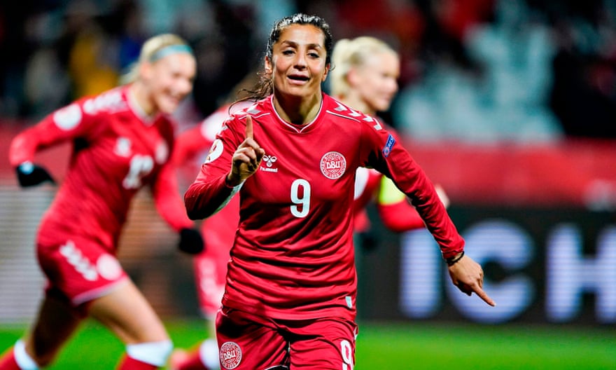 Nadia Nadim celebrates after scoring for Denmark. ‘I experience similar emotions or adrenaline rush inside the operating room,’ she says.