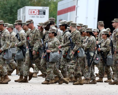 Members of the Texas national guard assemble in Elwood, Illinois, a southwest suburb of Chicago.