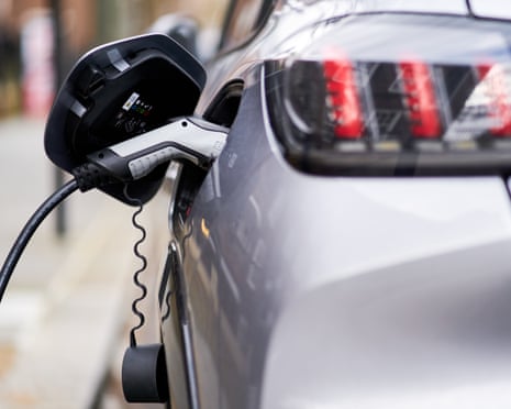 a car being charged at an electric charge point