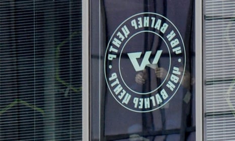 The Wagner logo is removed from the windows of the organisation’s closed-down office in St Petersburg.