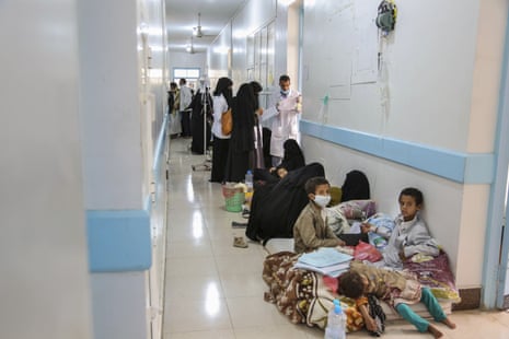 Patients suffering from suspected cholera wait to receive treatment at a hospital in Sana’a