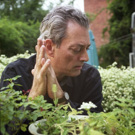 Portraits By Jean-Christian BourcartNEW YORK - OCTOBER 5: Writer Paul Auster poses for a portrait in his home garden on October 5, 2005 in New York City. (Photo by Jean-Christian Bourcart/Getty Images)