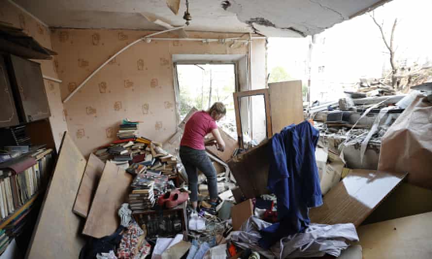 Ukrainian woman in her damaged house in Chernihiv Oblast, Ukraine.