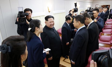North Korean leader Kim Jong Un with Chinese officials inside the special train on his surprise international debut.