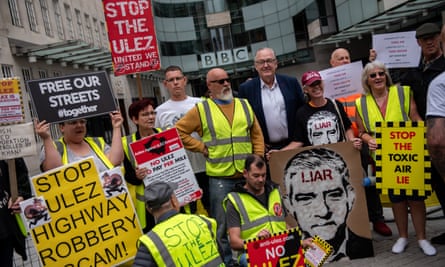 London mayoral candidate Howard Cox joins protesters opposed to the expansion of London’s Ultra Low Emissions Zone outside BBC Broadcasting House.