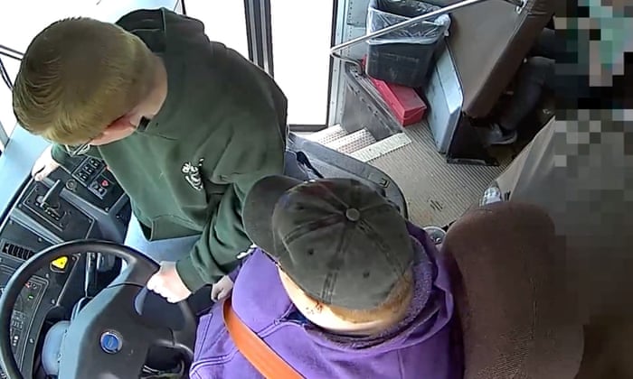 Michigan boy hailed as hero for preventing bus crash after driver fainted (theguardian.com)