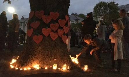 Protesters hold a vigil to save an oak.
