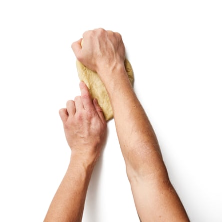 premix oil, lukewarm h2o and brackish into the flour, bring into a dough, and knead briefly