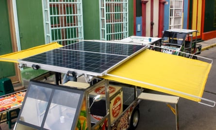Solar panels on the roof of one of the electric vehicles.