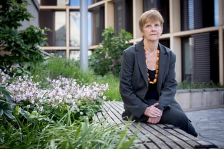 Dr Dorothy Bishop sitting in a garden