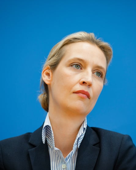 Head and shoulders photograph of Alice Wedel against a blue background