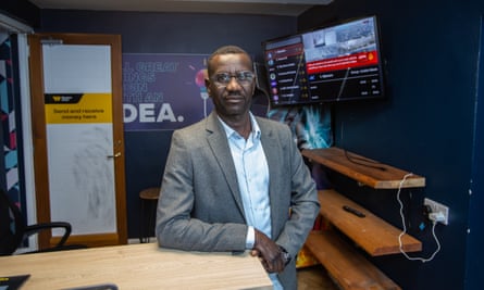 Mohammed Idris in his internet cafe
