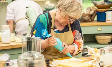 Woman piping in the Bake Off tent