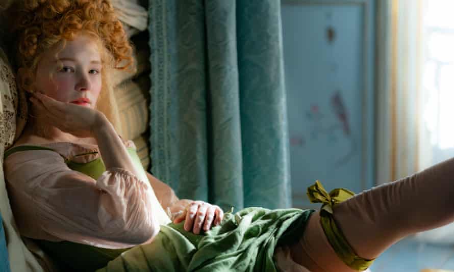 Haley Bennett in Cyrano, elaborately costumed with garter and tights on show