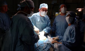 Lord Darzi (centre), picture in 2007 St Mary’s Hospital. Darzi has led a team working on a smartphone app that is being developed by DeepMind and piloted at St Mary’s.