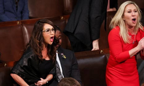 Lauren Boebert and Marjorie Taylor Greene, pictured at the 2023 State of the Union address, were part of the congressional delegation to visit January 6 Capitol attack defendants.