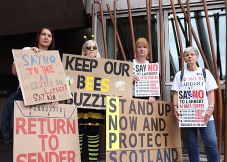 People protest outside Holyrood in Edinburgh against mass AI datacentre build-out.