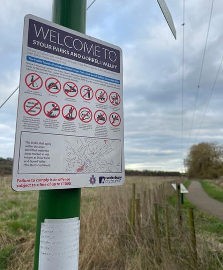 A a notice on a pole in rural Kent threatening a £1,000 fine for engaging in 12 activities, including shouting, swearing, drinking alcohol or using a catapult