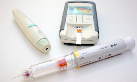 Diabetic treatment items: syringe, insulin and blood tester.