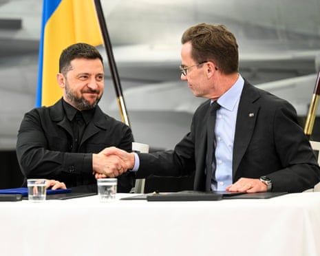 Swedish prime minister Ulf Kristersson and Ukrainian president Volodymyr Zelenskyy sign a letter of intent during a press conference following their meeting and visit to Saab in Linkoping, Sweden in October last year.