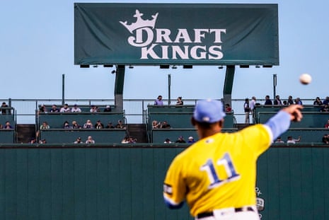 A bill board for Draft Kings at a baseball stadium
