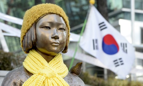 A statue of a girl that represents the sexual victims by the Japanese military in front of Japanese embassy in Seoul, South Korea