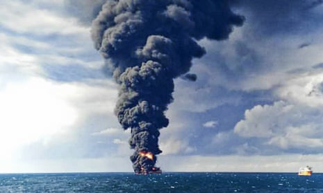 Smoke and flames from the burning Iranian oil tanker Sanchi in the East China Sea.