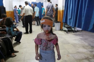 General news, second prize, stories - Abd Doumany A wounded girl at a makeshift hospital, following shelling and air raids by Syrian government forces