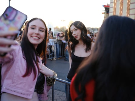 Skiendiel poses for a selfie with competition winner Emily Smith