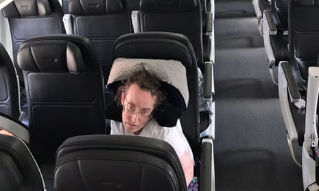 Victoria Brignell, a disabled passenger, waits  on a plane