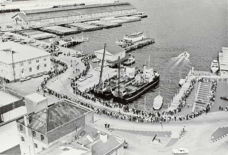 People queue for the trans-Derwent ferry at the Hobart wharves in January 1975