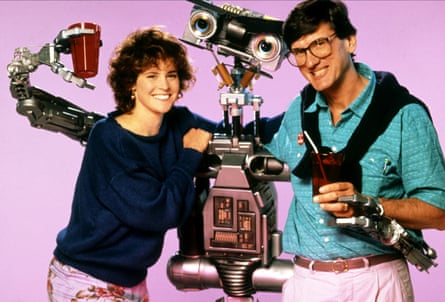 director John Badham, right, with Number 5 and human co-star Ally Sheedy.